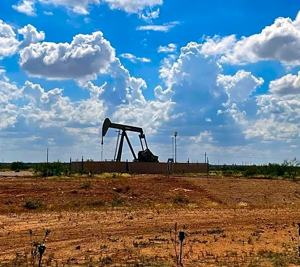 Oil prices down $2 a barrel on supply forecast