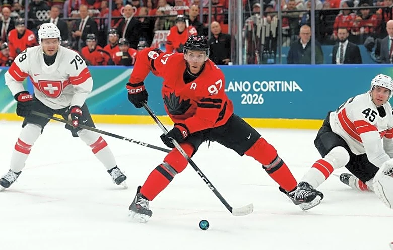 Olympics-Ice hockey-McDavid scores first Games goal as Canada beat Switzerland