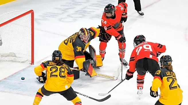 Olympics-Ice hockey-Canada into semis, with Poulin back from injury and equalling scoring record