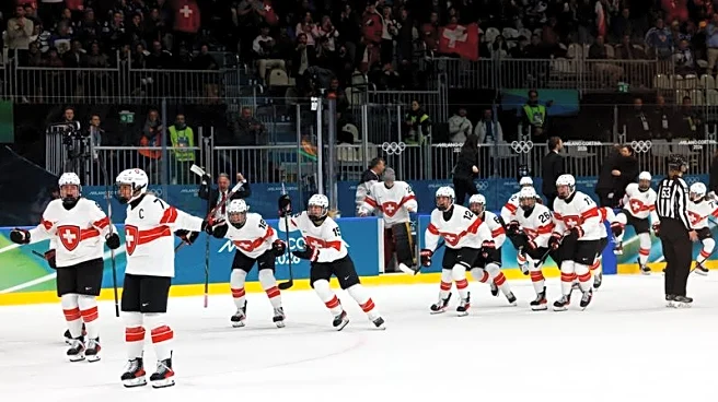 Olympics-Ice hockey-Switzerland into semis after Muller goal downs Finland