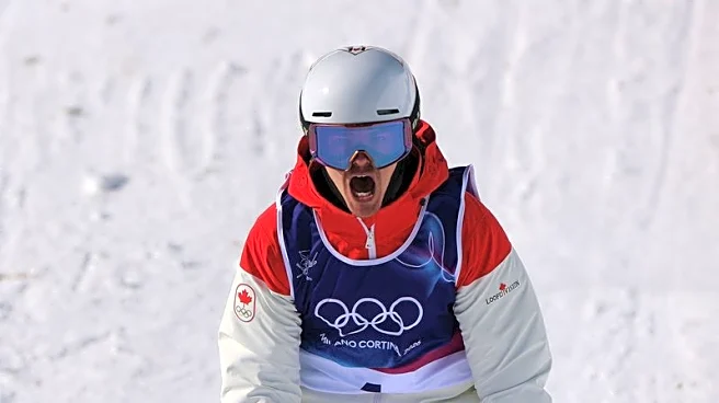 Olympics-Freestyle-Canada's Kingsbury takes gold in men's dual moguls