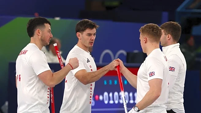 Olympics-Curling-Britain's men beat Germany, champions Sweden lose again
