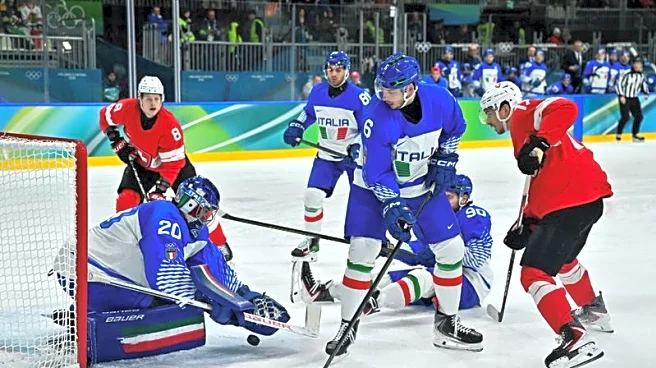 Olympics-Ice hockey-Swiss ease past Italy to set up quarter-final with Finland