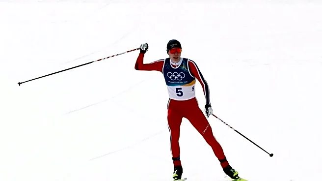 Olympics-Nordic combined-Norway's Oftebro powers to gold with late surge in men's large hill