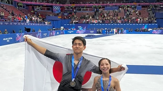 Olympics-Figure skating-Japan's Miura and Kihara say pairs gold 'hasn't hit' after comeback win
