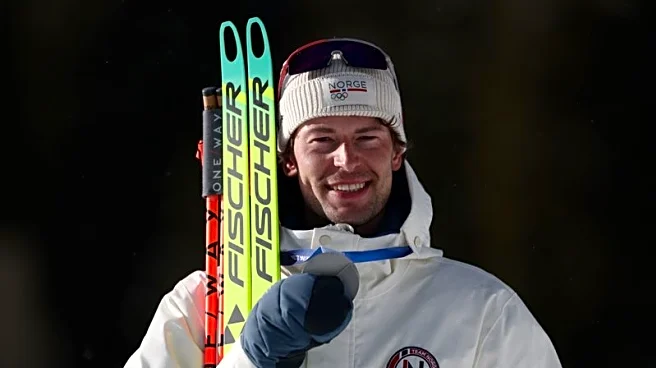 Olympics-Biathlon-Norway's Laegreid signs off with fifth medal at Milano Cortina Games