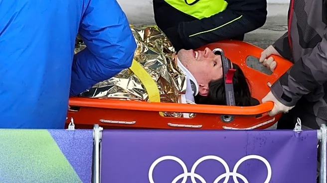 Olympics-Bobsleigh-Austria's Mandlbauer avoids serious injury after horror crash