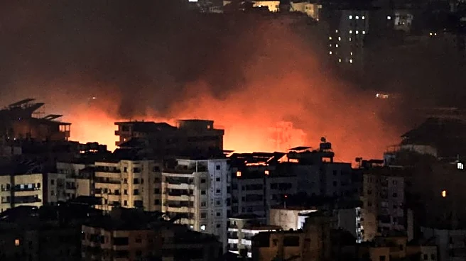 Israeli airstrikes pound Beirut suburb, Hezbollah warns Israelis