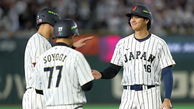 Baseball-Japan power past Australia in front of Emperor Naruhito