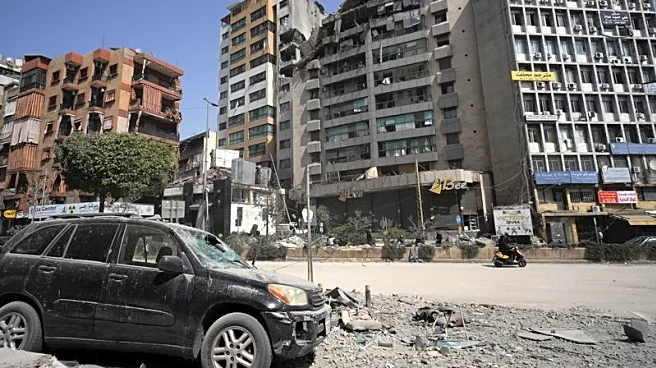 Israel strikes heart of Beirut, signals long campaign
