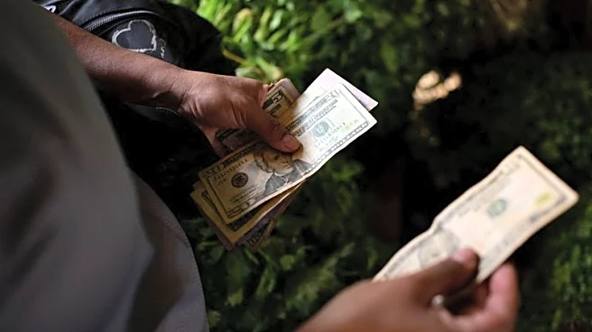 Dollar scarcity in Venezuela forces small firms to raise prices, turn to crypto