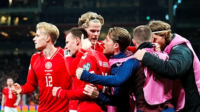 Soccer-Isaksen double keeps alive Denmark's World Cup dream