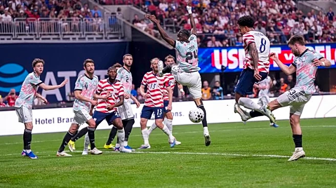 Soccer-Easy win for Belgium over US rings alarm bells for World Cup co-hosts