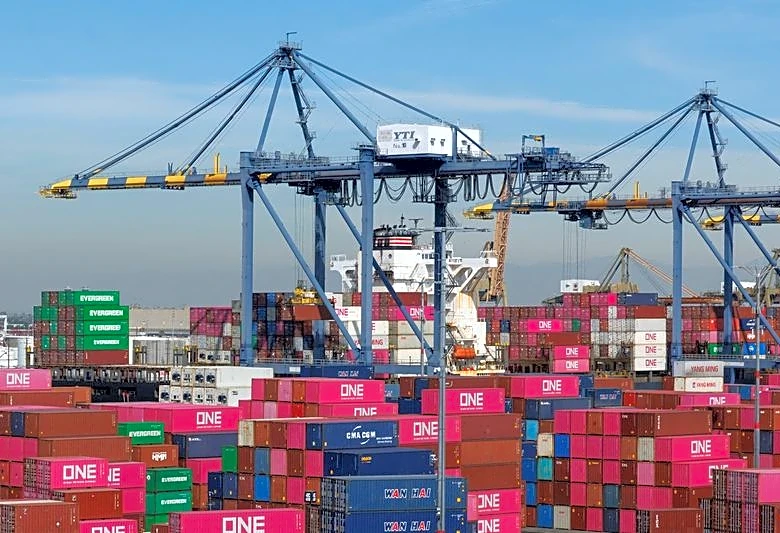 US trade deficit widens in February as imports offset record exports