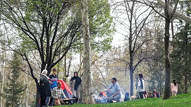 Iran leaders join crowds on Tehran's streets to project control in wartime