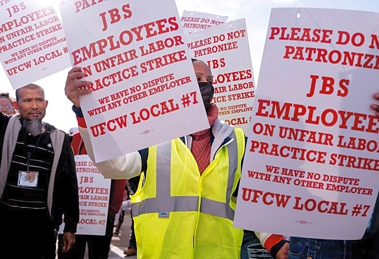 Striking JBS workers to return to Colorado plant on promise of talks