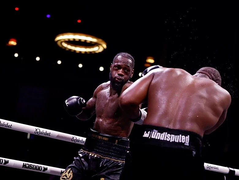 Boxing-Wilder calls out Joshua after win over Chisora