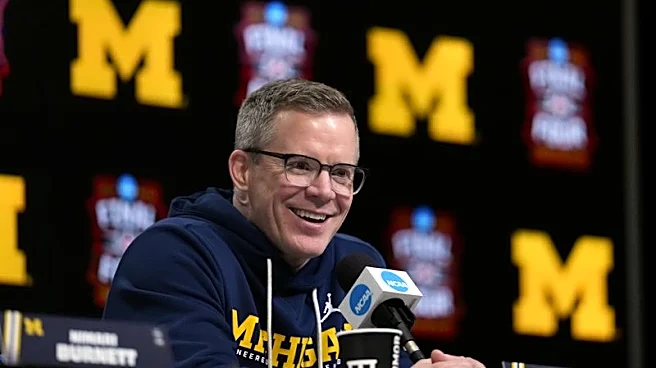 Dusty May informs Michigan officials of intention to stay put, spurn UNC