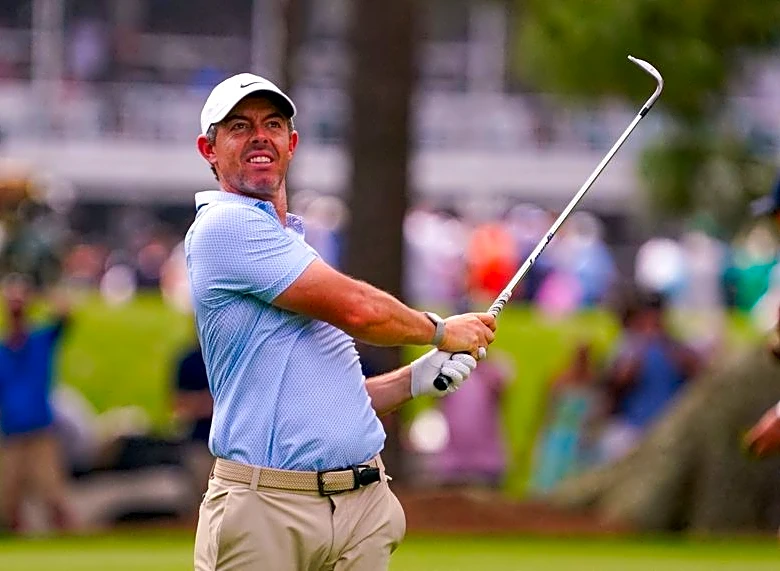 Golf-McIlroy arrives at Augusta unburdened as Scheffler leads Masters odds