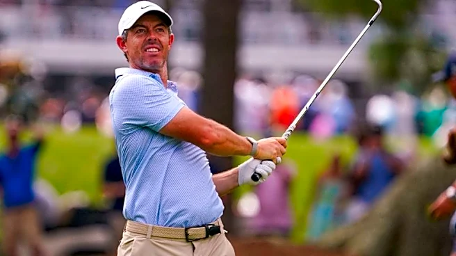Golf-McIlroy arrives at Augusta unburdened as Scheffler leads Masters odds