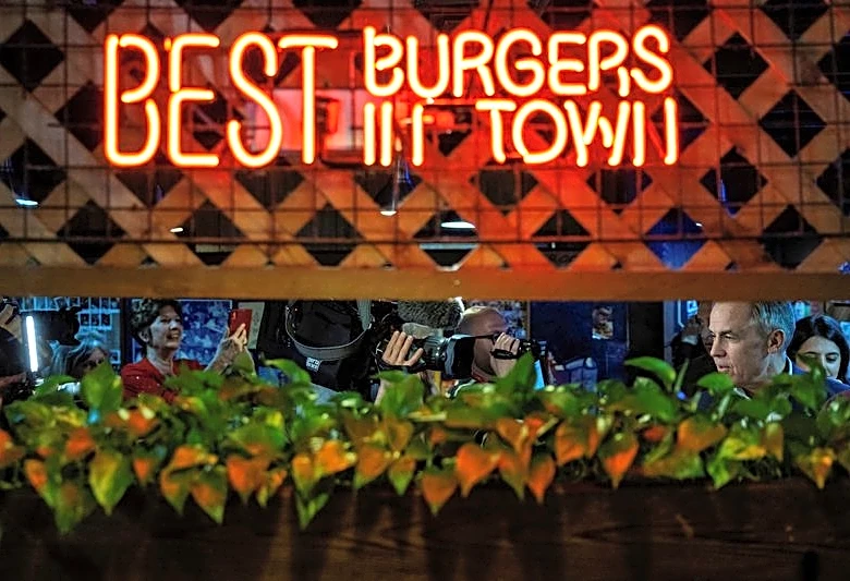 Canada's services economy shrinks as war delays client decision-making