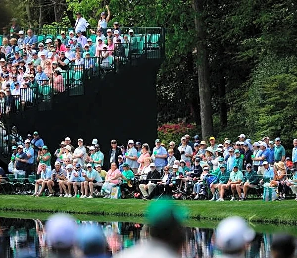 Golf-Absence of Woods and Mickelson from Masters felt around Augusta National