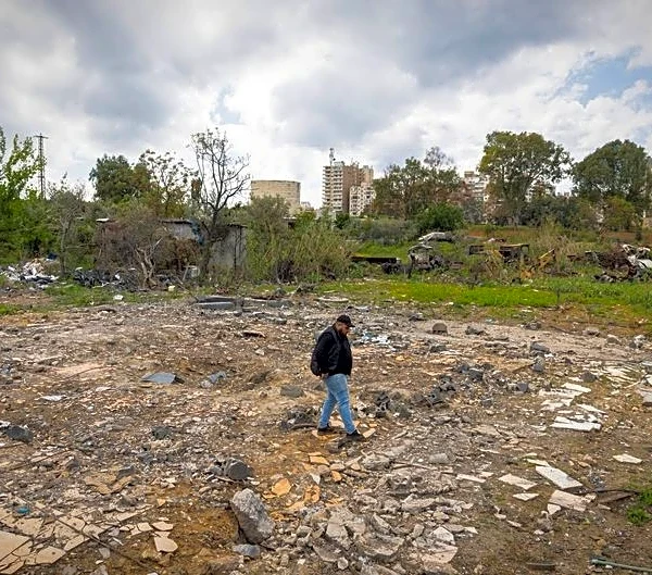Lebanese man scours home bombed by Israel for mementos of his slain family