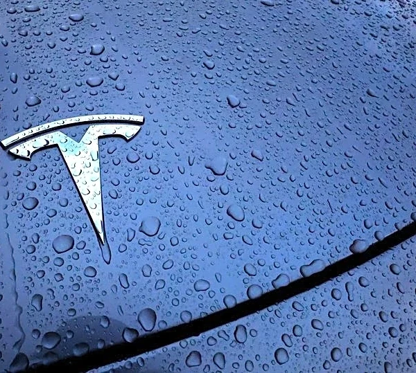 Exclusive-Tesla is developing a new smaller, cheaper EV, sources say
