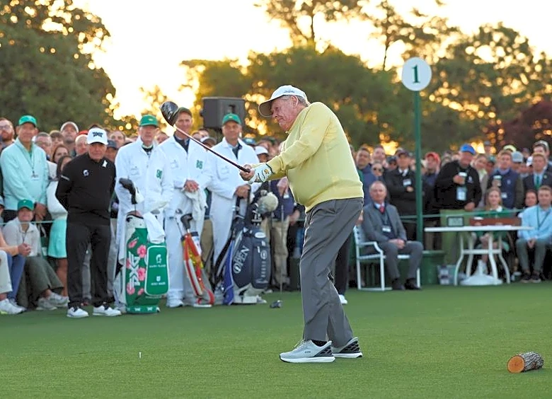 Golf-Fore! Nicklaus hooks one into the gallery as legends kick off the Masters