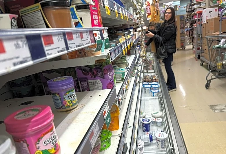 US fourth-quarter GDP growth revised lower to a 0.5% rate