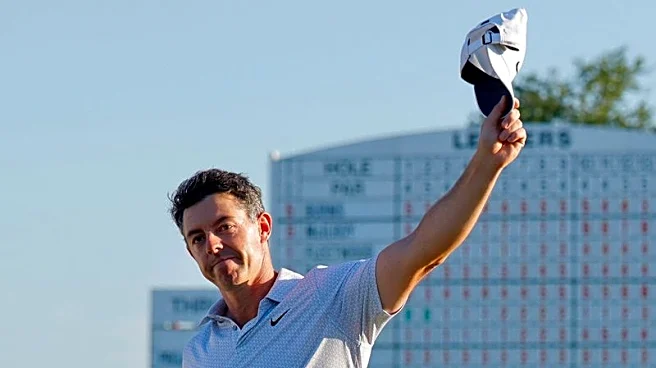 Golf-McIlroy looks to build on six-shot Masters lead