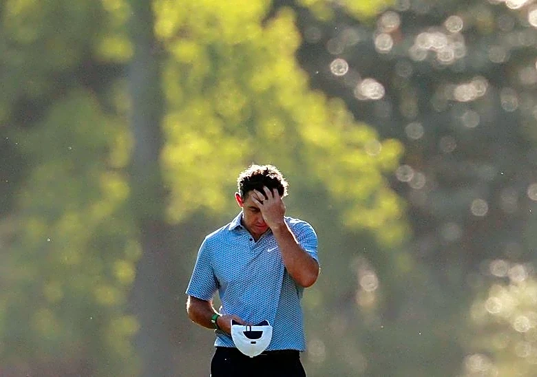 Golf-McIlroy's Masters cruise hits the skids at Amen Corner
