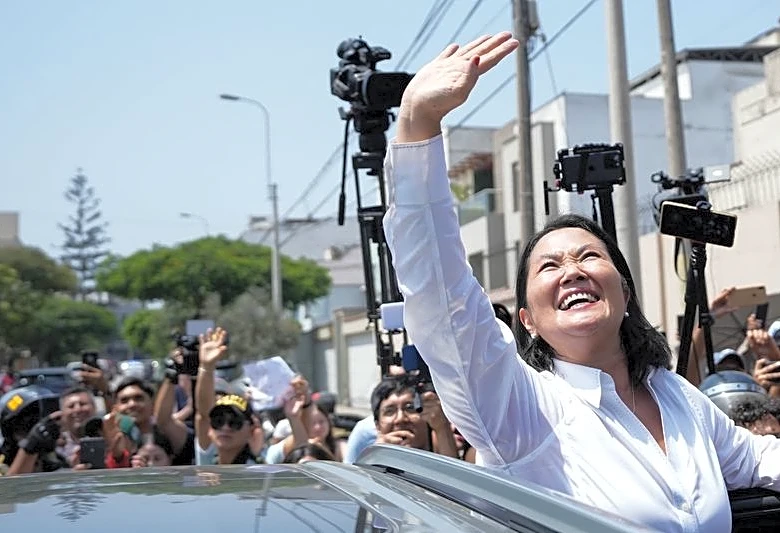 Conservative Fujimori holds lead in Peru's election as voting, count move into second day