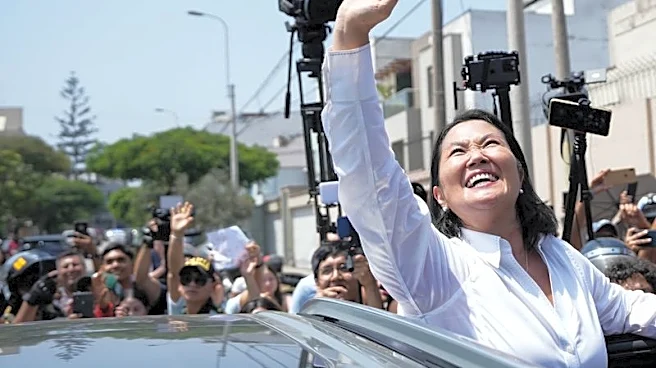 Conservative Fujimori holds lead in Peru's election as voting, count move into second day