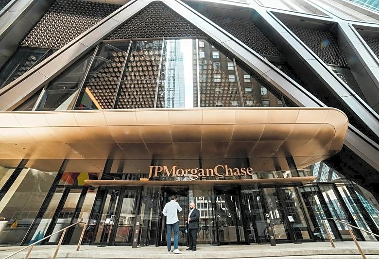 JPMorgan profit rises as volatile markets drive trading division