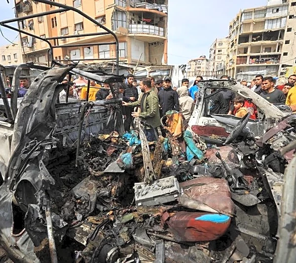 Israeli strike hits police car in Gaza, killing four, medics say