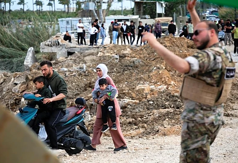 Lebanese trickle home as ceasefire with Israel mostly holds