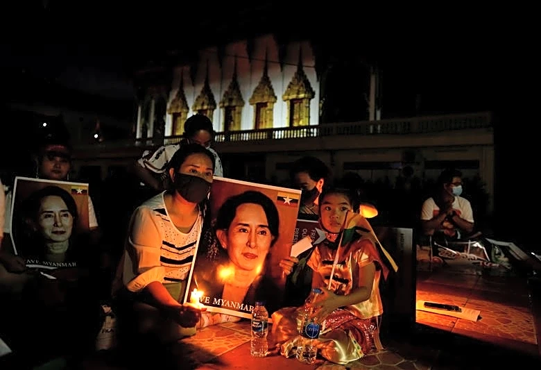 Myanmar cuts ex-leader Aung San Suu Kyi's sentence, frees former president