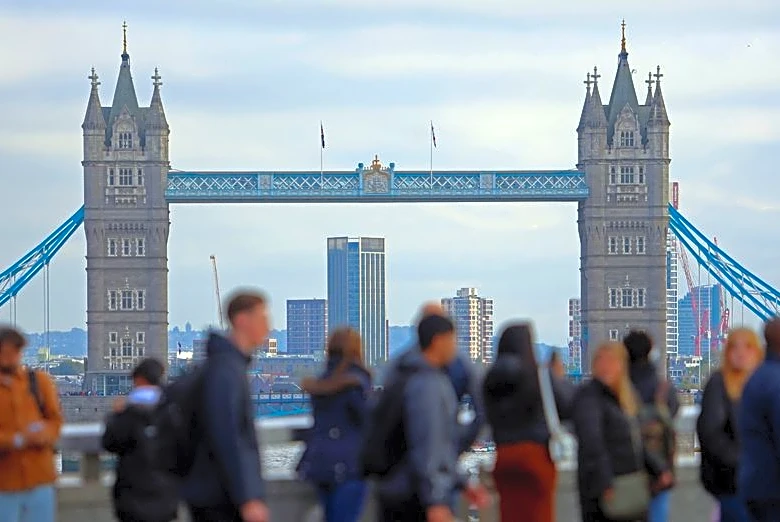 UK labour market cools by less than expected in three months to February