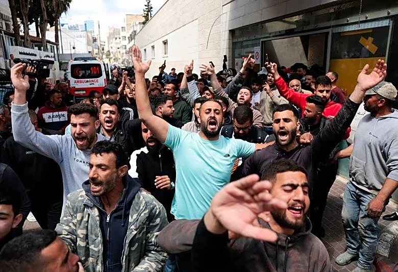 Two Palestinians killed in West Bank village by Israeli settlers, witnesses say