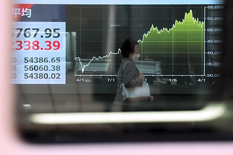 Asian shares track Wall Street to record highs but higher oil prices a risk