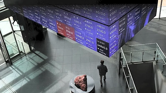 Japan's Nikkei crosses key 60,000 level for first time on tech rally