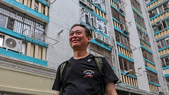 Hong Kong fire victim returns to search for memories of his dog