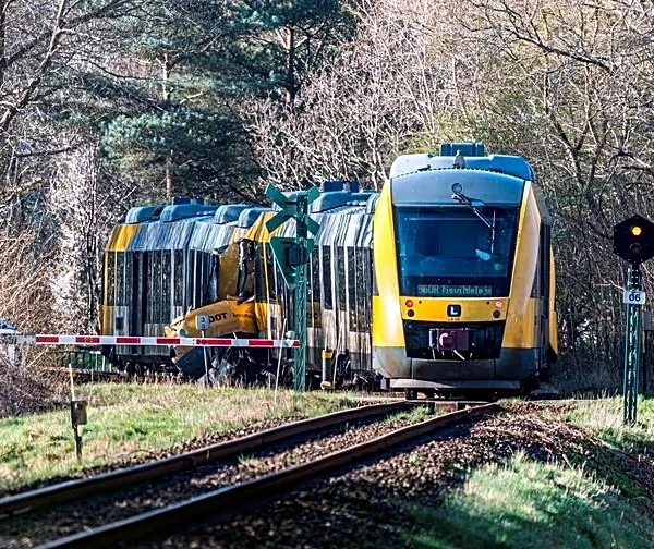 Two trains collide in Denmark, injuring 17 people, emergency service says