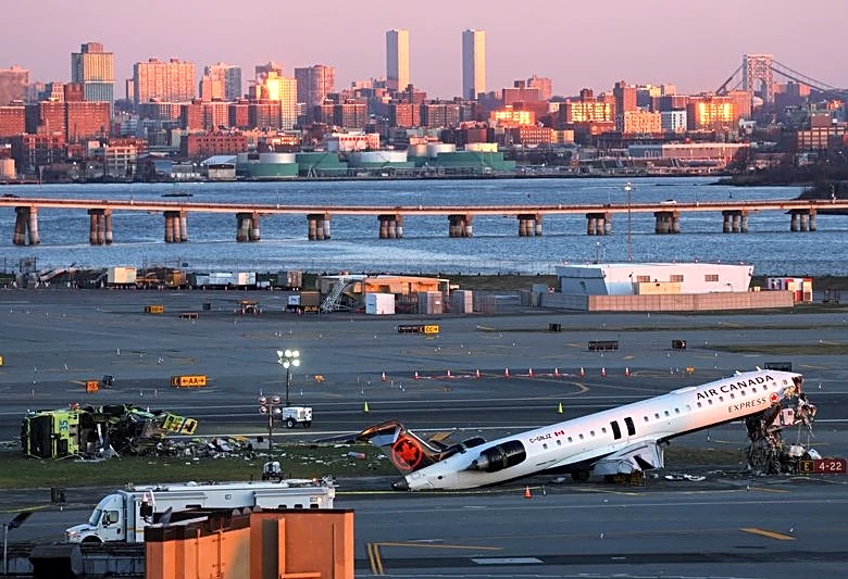 NTSB says runway safety system did not activate before fatal Air Canada Express collision