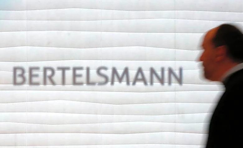 Bertelsmann merges firms behind Kylie Minogue, Miles Davis to create world's No.4 music group