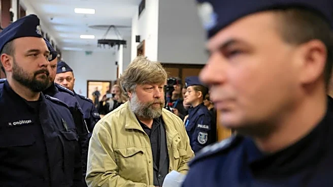 Belarus frees Polish journalist, Warsaw frees Russian archaeologist in prisoner swap