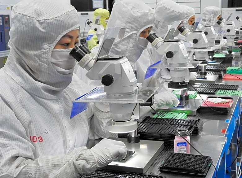 China's factory activity set to expand at a slower clip in April: Reuters poll