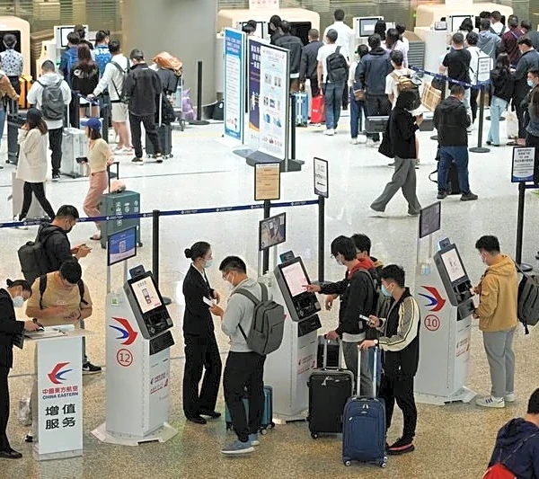 Flight cancellations and high fuel prices help keep Chinese close to home for May holidays