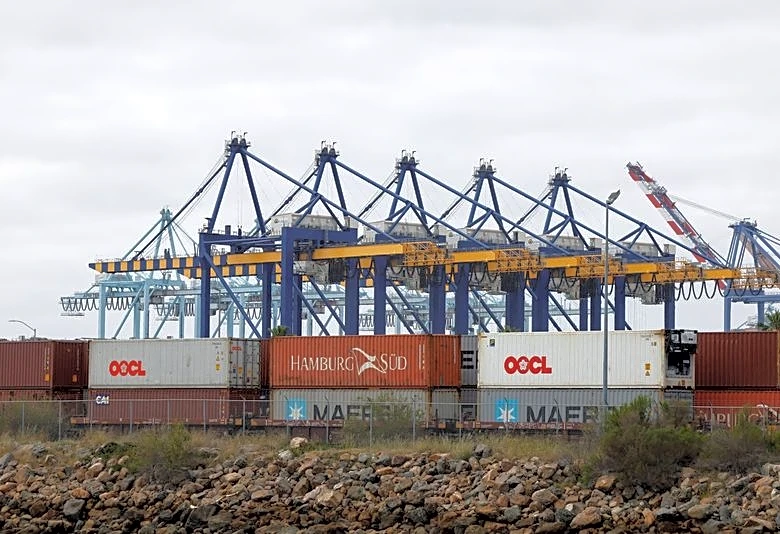 US goods trade deficit widens in March as imports rise sharply